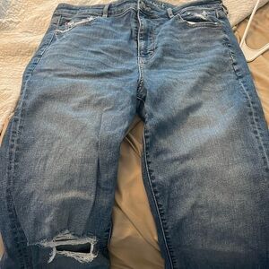 Distressed women’s flair jeans.